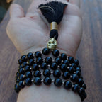 Sovereign Flame Mala With Black Obsidian and Brass Skull Guru