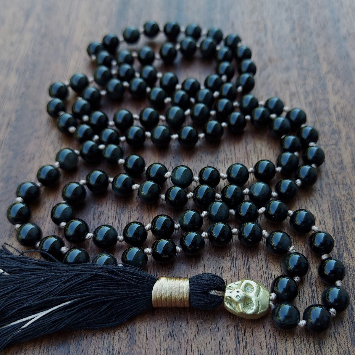 Sovereign Flame Mala With Black Obsidian and Brass Skull Guru