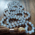 Devotion in Light Mala with White Jade and Carved Bodhi Tree Root Guru