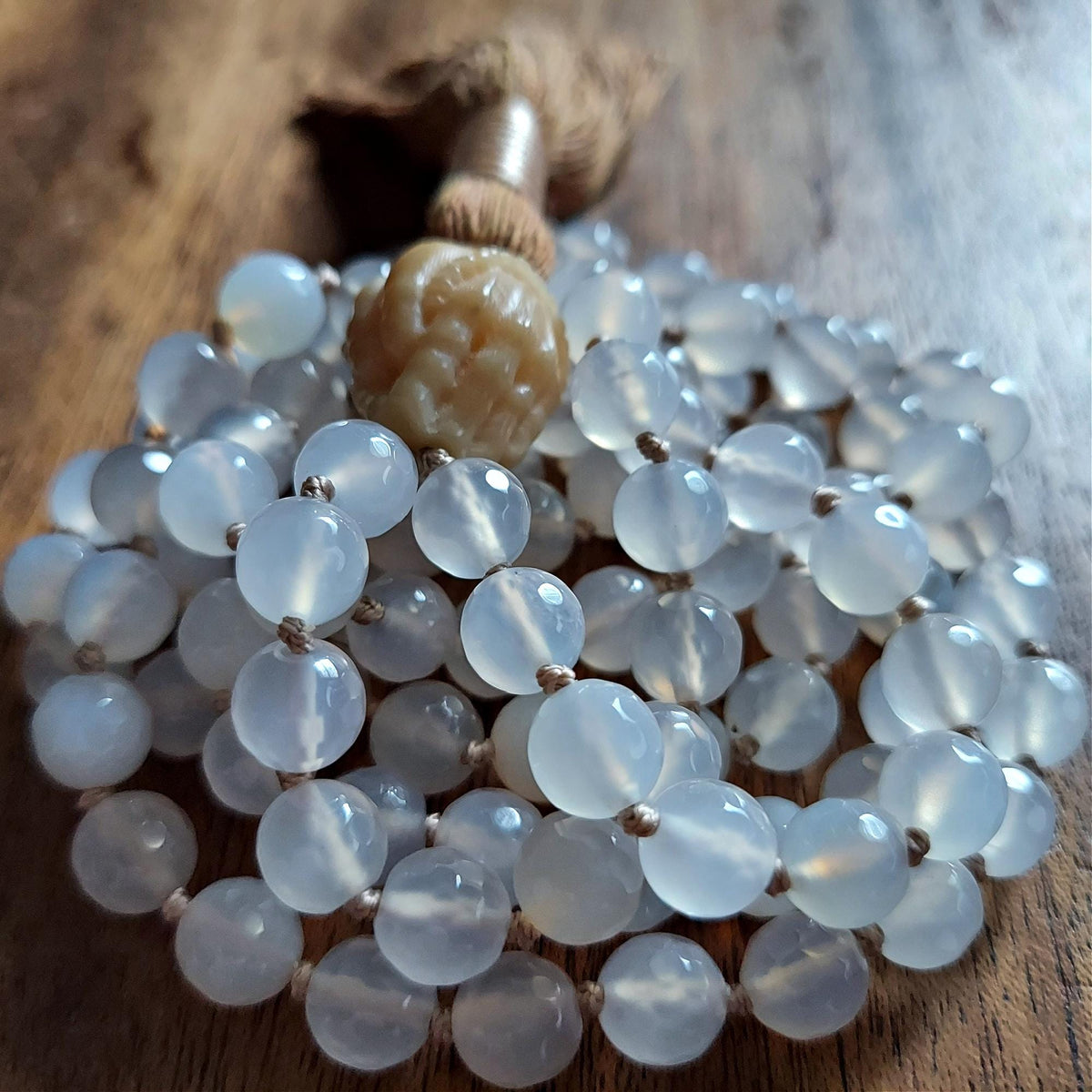 Devotion in Light Mala with White Jade and Carved Bodhi Tree Root Guru