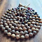 Fierce Heart Mala with Faceted Tiger's Eye, Garnet, and Raw Red Ruby