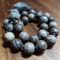Fossil Pocket Mala with Petrified Wood, Ocean Fossil, and Stegodon Bone Fossil Guru