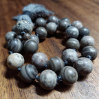 Fossil Pocket Mala with Petrified Wood, Ocean Fossil, and Stegodon Bone Fossil Guru