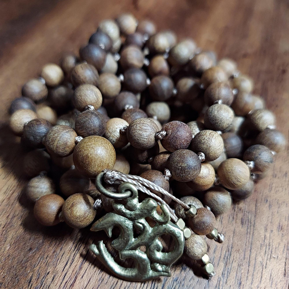Sacred Smoke Mala with Sandalwood and Brass OM Pendant