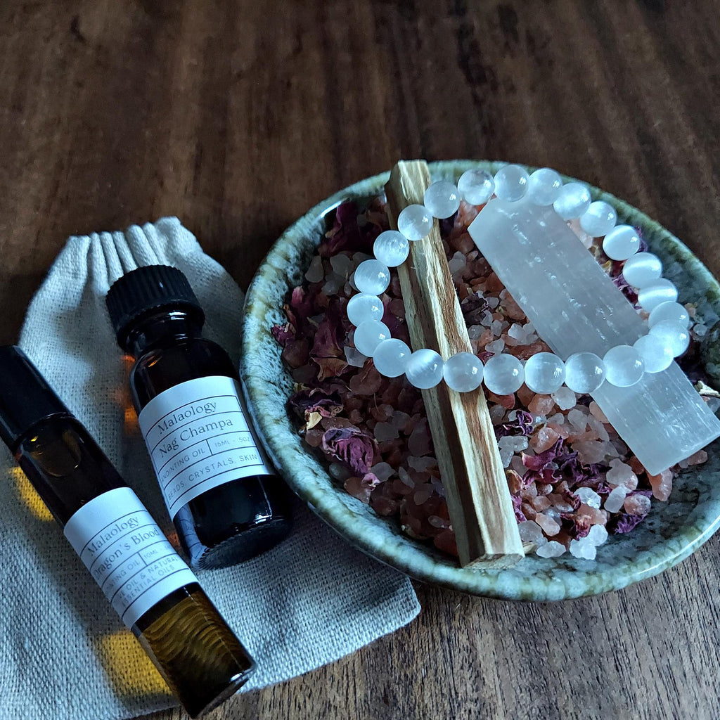Deluxe Crystal Cleansing Kit with Selenite Bracelet, Nag Champa Anointing Oil, Palo Santo, Salt Blend, and Dragons Blood