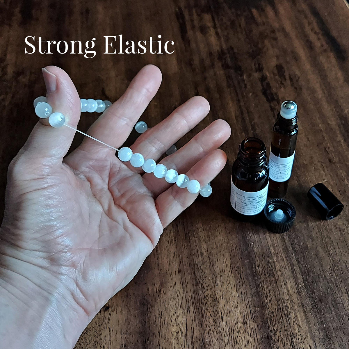 Deluxe Crystal Cleansing Kit with Selenite Bracelet, Nag Champa Anointing Oil, Palo Santo, Salt Blend, and Dragons Blood