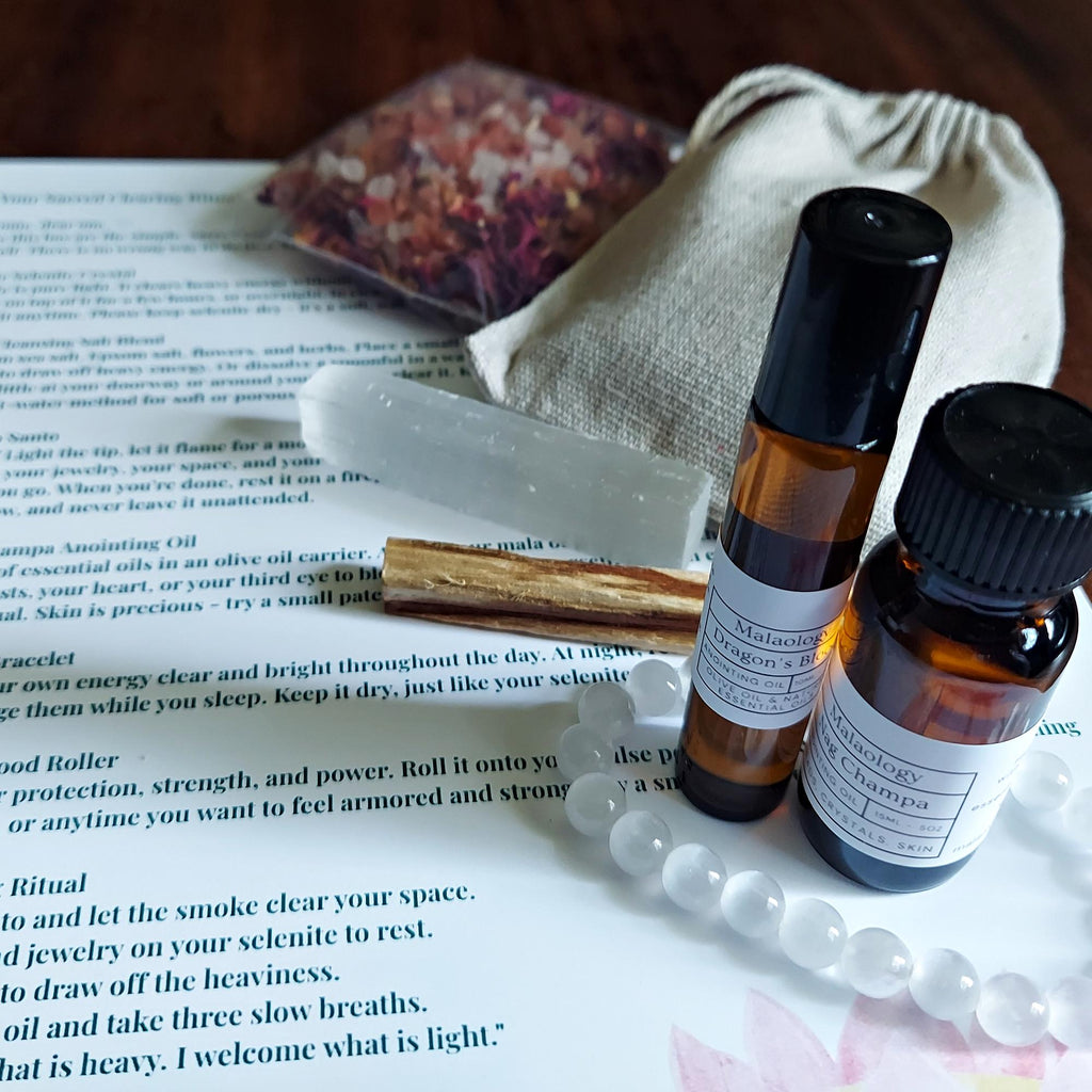Deluxe Crystal Cleansing Kit with Selenite Bracelet, Nag Champa Anointing Oil, Palo Santo, Salt Blend, and Dragons Blood
