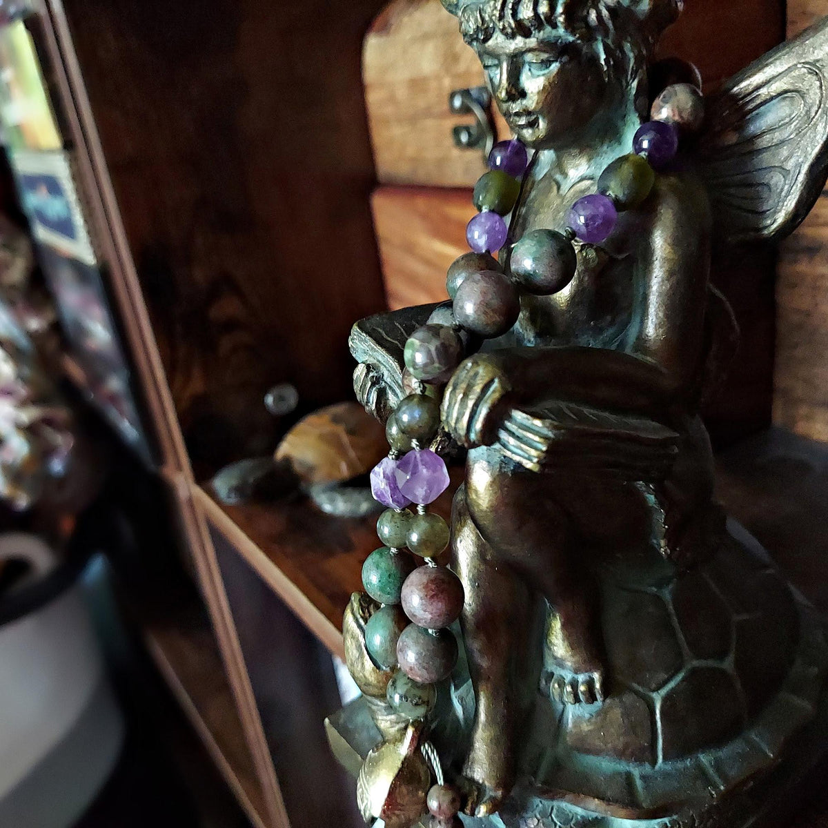 The Thistle Dragon Pocket Mala with Garnet, Antique Glass, and Brass Bell