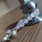 The Moonflower Pocket Mala with Rose Quartz, Selenite, Kunzite, and Brass Bell