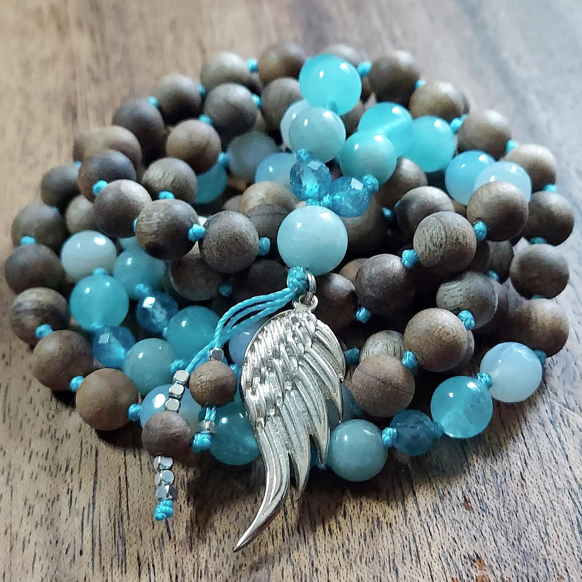 Archangel Sandalphon Mala with Blue Topaz, Amazonite, Sandalwood, and Sterling Silver Wing