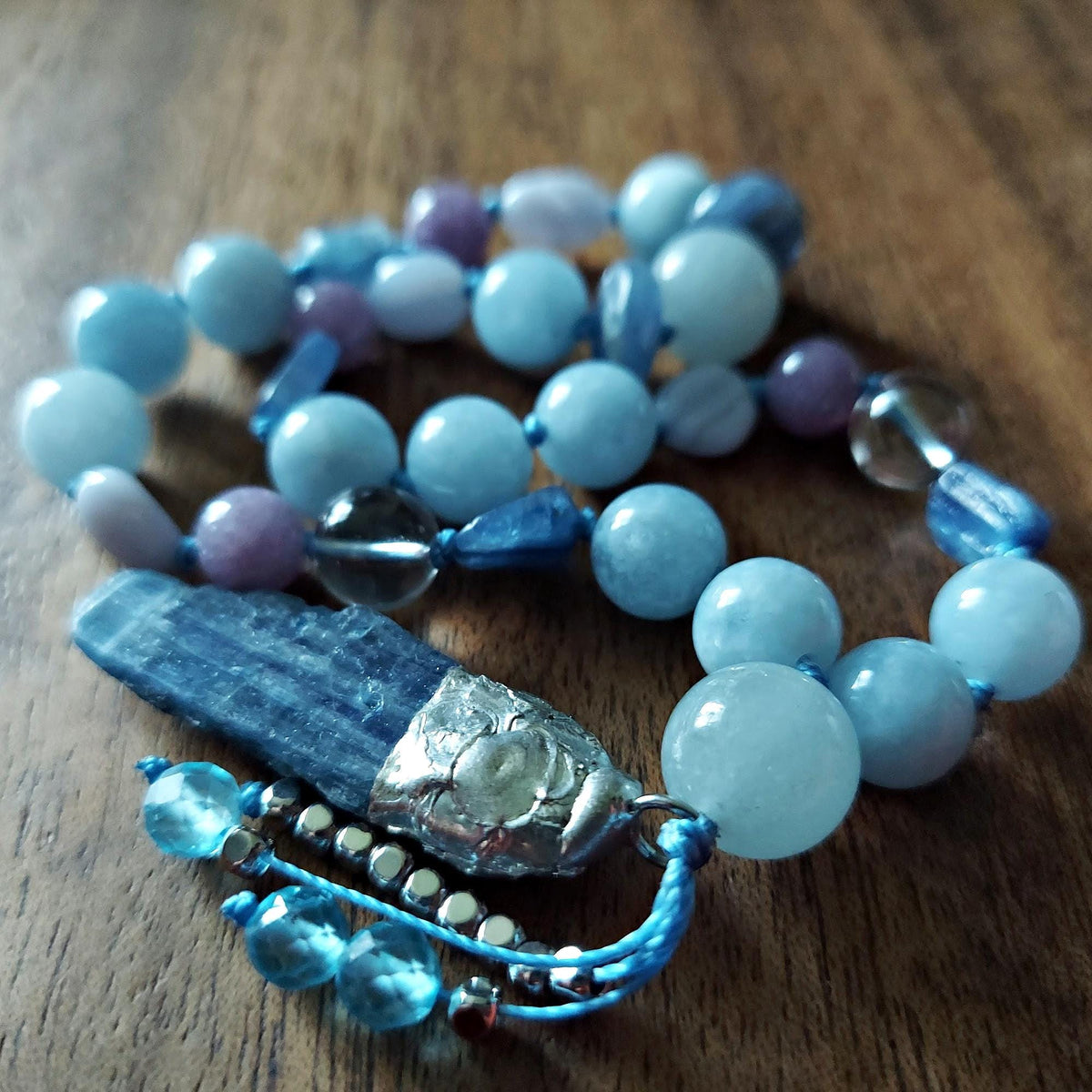 The Frost Dragon Pocket Mala with Blue Jade, Aquamarine, and Kyanite Pendant