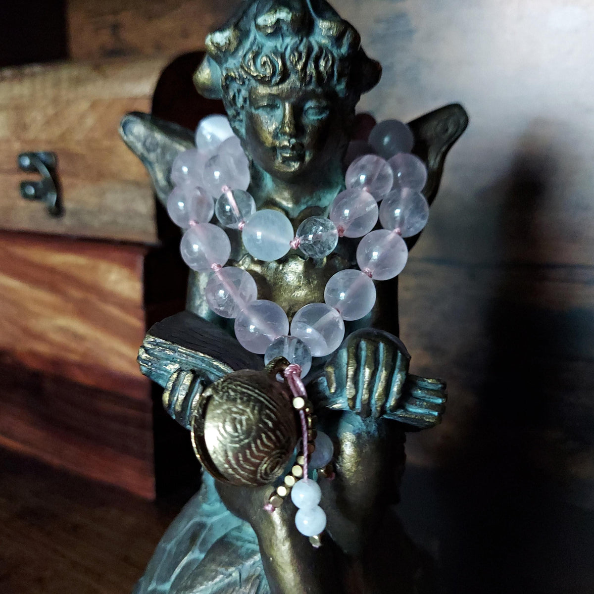 The Moonflower Pocket Mala with Rose Quartz, Selenite, Kunzite, and Brass Bell