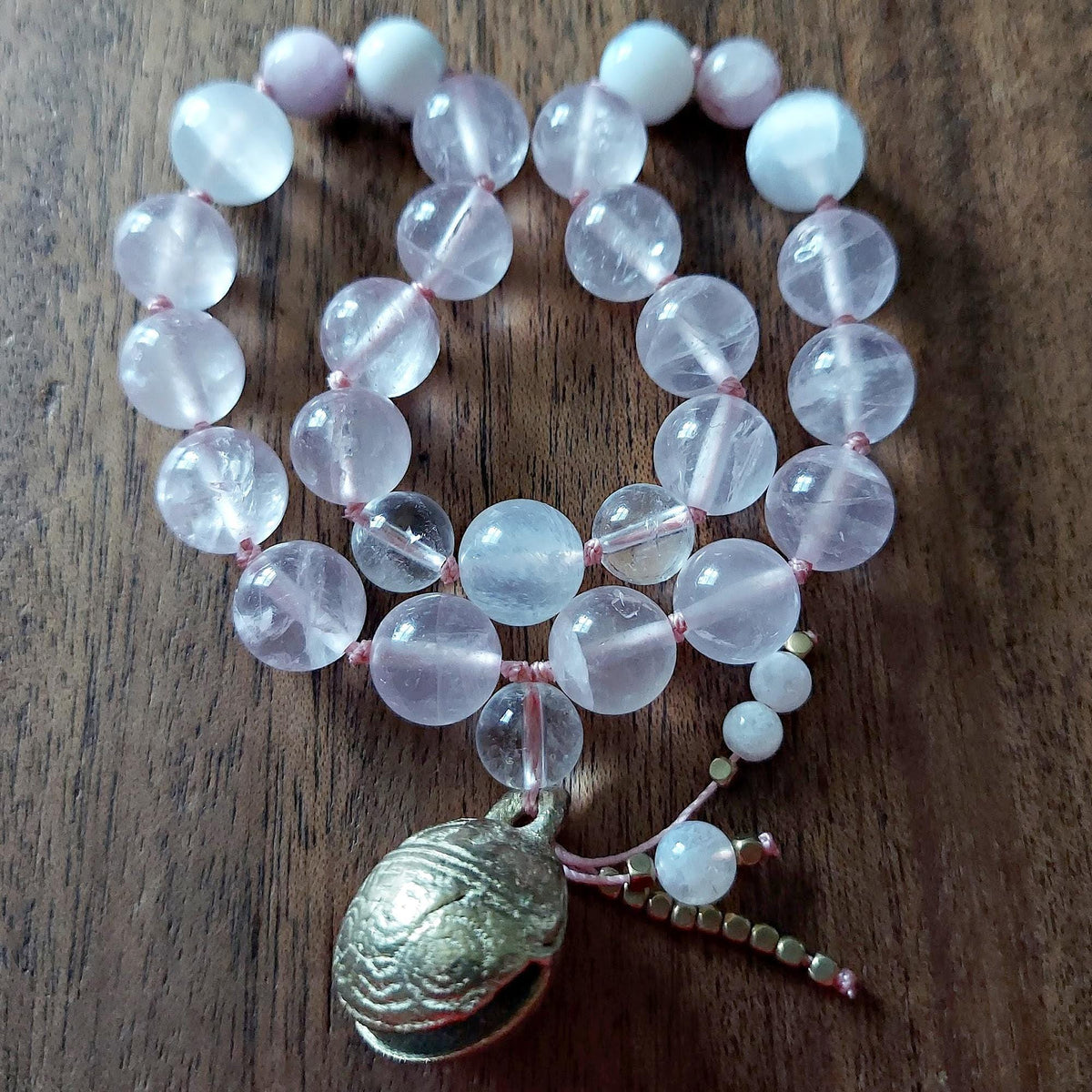 The Moonflower Pocket Mala with Rose Quartz, Selenite, Kunzite, and Brass Bell