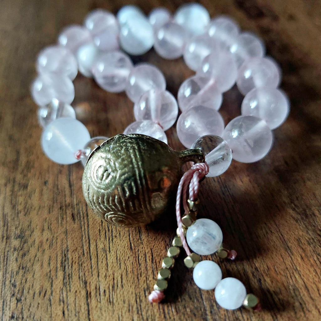 The Moonflower Pocket Mala with Rose Quartz, Selenite, Kunzite, and Brass Bell