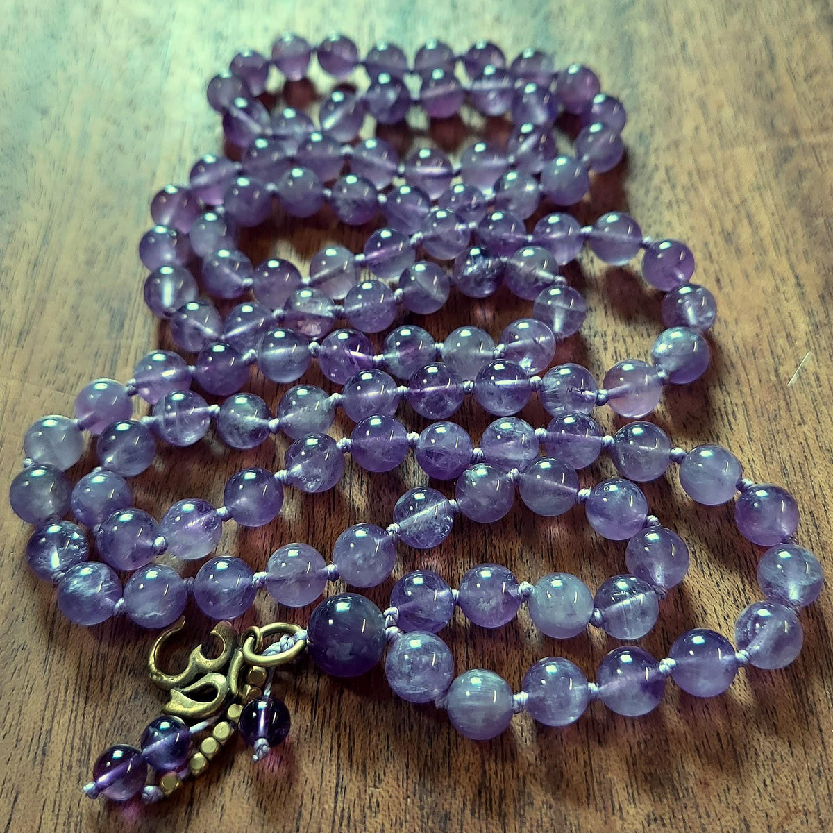 Sacred OM Mala with Dream Amethyst and Brass OM charm