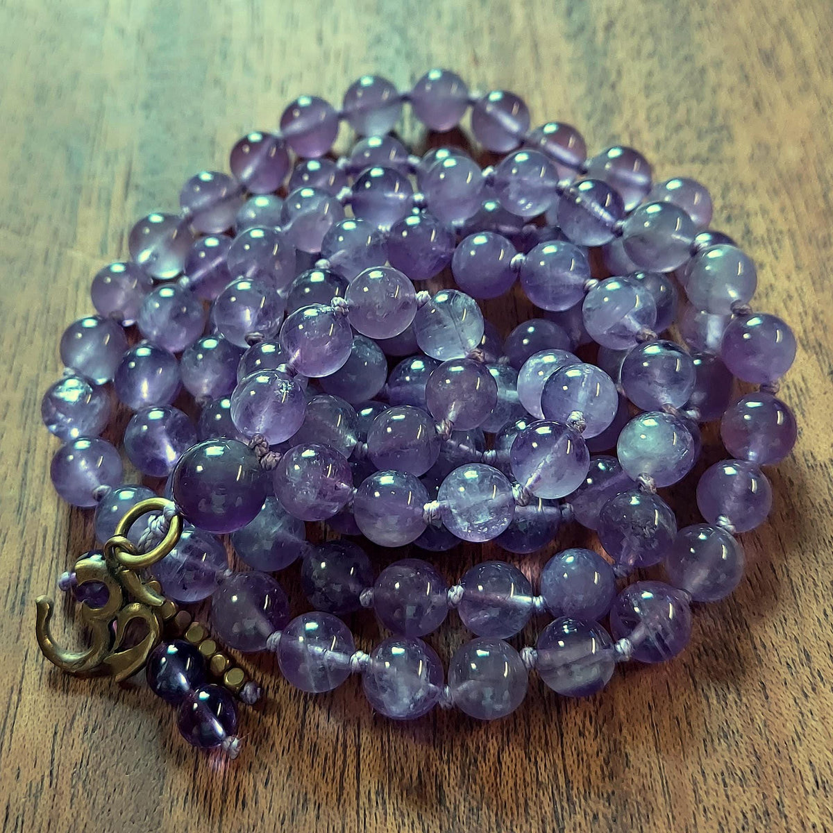 Sacred OM Mala with Dream Amethyst and Brass OM charm